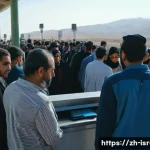 이스라엘 이집트 국경 여행 팁 - A detailed scene at the Israel-Egypt border checkpoint during daytime, showing a diverse group of tr...